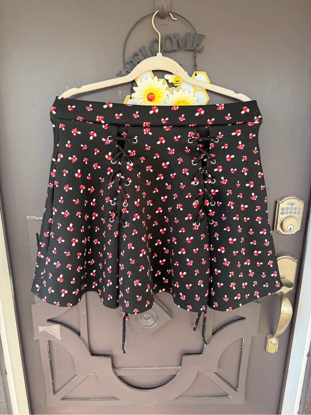 Hot Topic Black Skater Skirt with Red & White Mushroom Print and Lace-Up Front